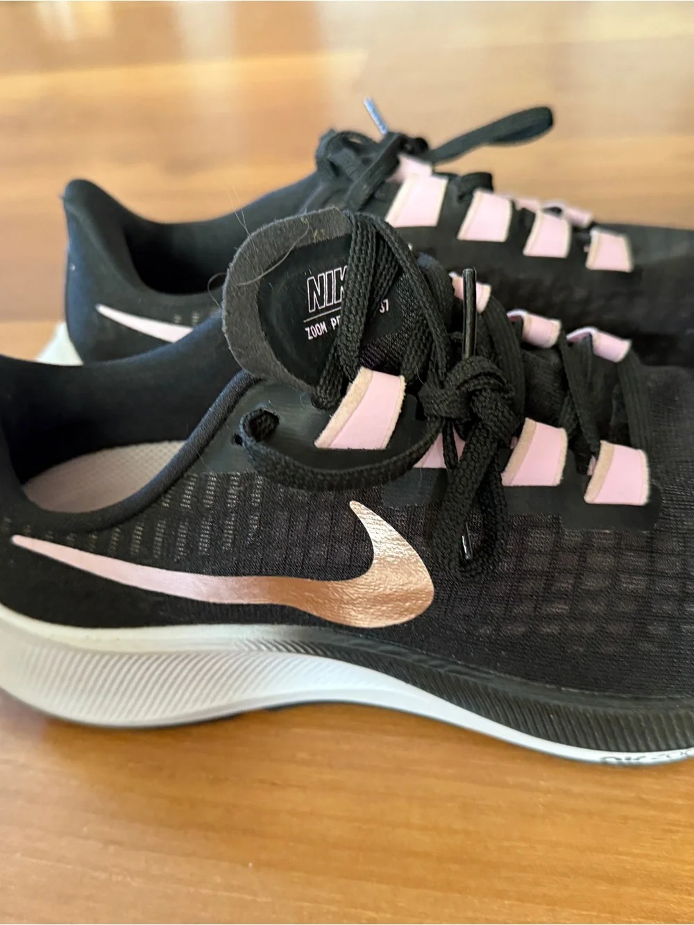 Nike Black Athletic Sneakers with Light Pink Accents